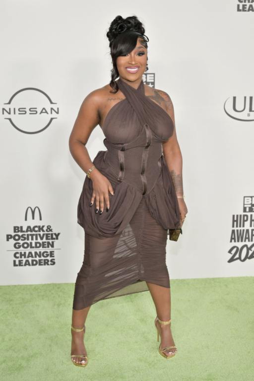 Erica Banks wearing a brown dress at the BET Hip Hop Awards 2023