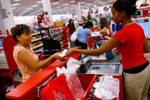 Woman receives her change from a Target cashier