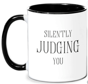 Black and white mug with the words silently judging you