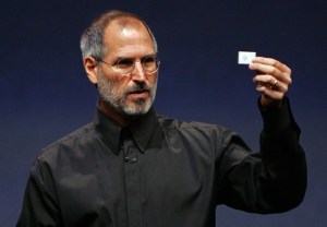 Apple CEO Steve Jobs holds up a new iPod Shuffle as he delivers a keynote address during an Apple media event September 12, 2006 in San Francisco.