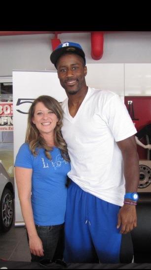 Shannon Renee poses with former Detroit Lions player Nate Burleson